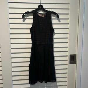BCBG. Black and nude sleeveless dress. Size xs. Worn once